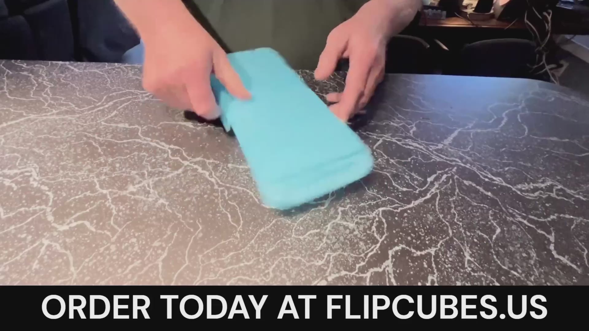 Load video: Video demonstration showing a FlipCubes ice cube tray being flipped upside down to release ice cubes cleanly without spills